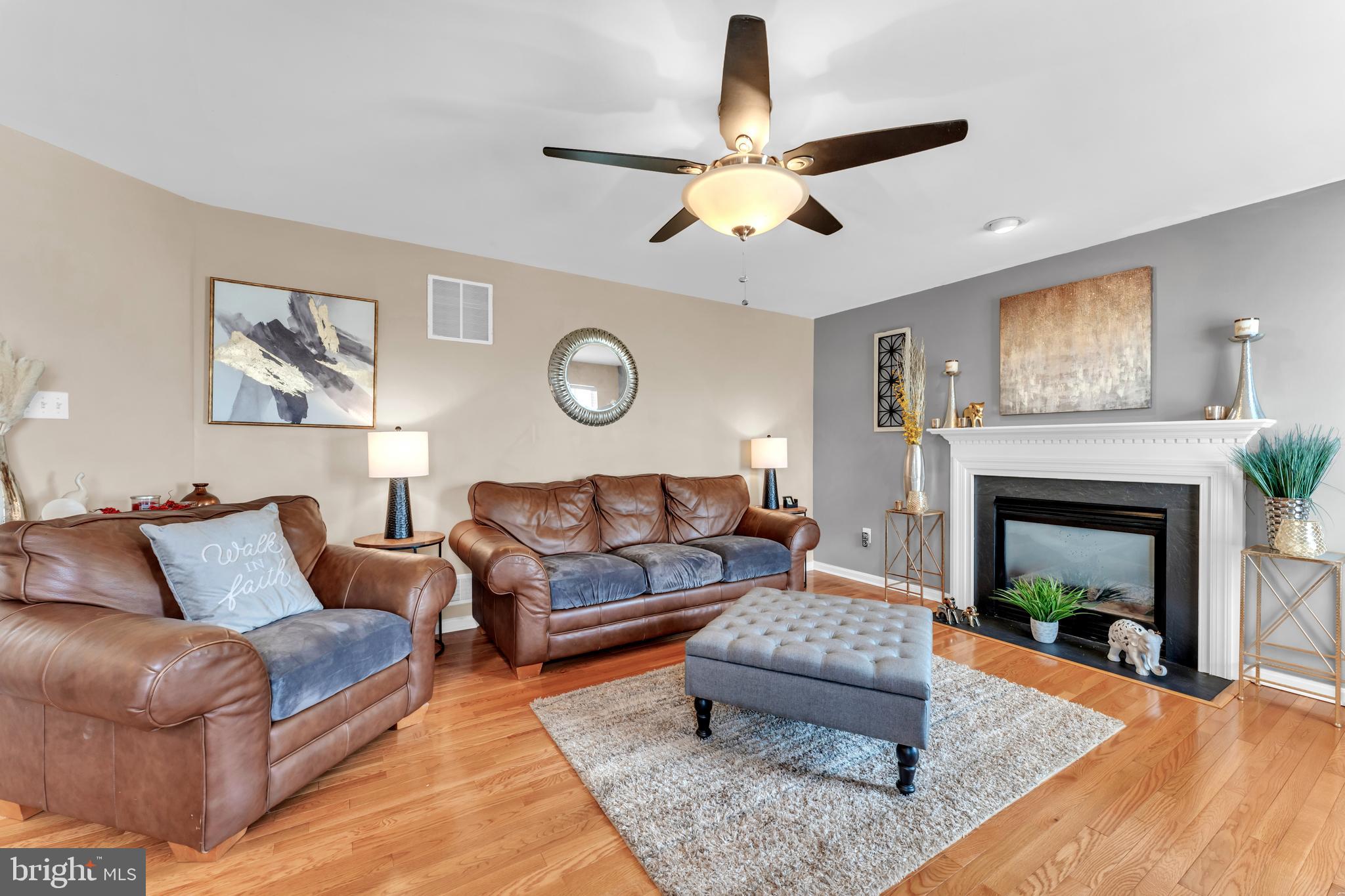 5660 Compton Lane Eldersburg, MD 21784 - Photo 11 of 44 a living room with furniture and a fireplace