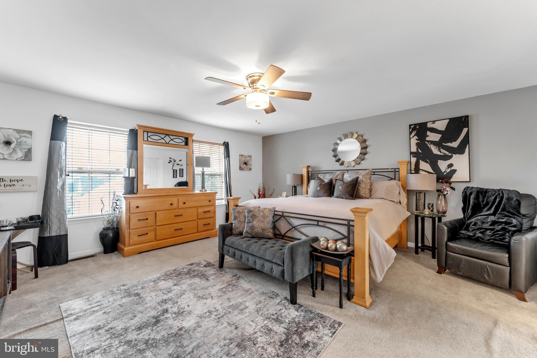 5660 Compton Lane Eldersburg, MD 21784 - Photo 25 of 44 a bedroom with a bed and a couch