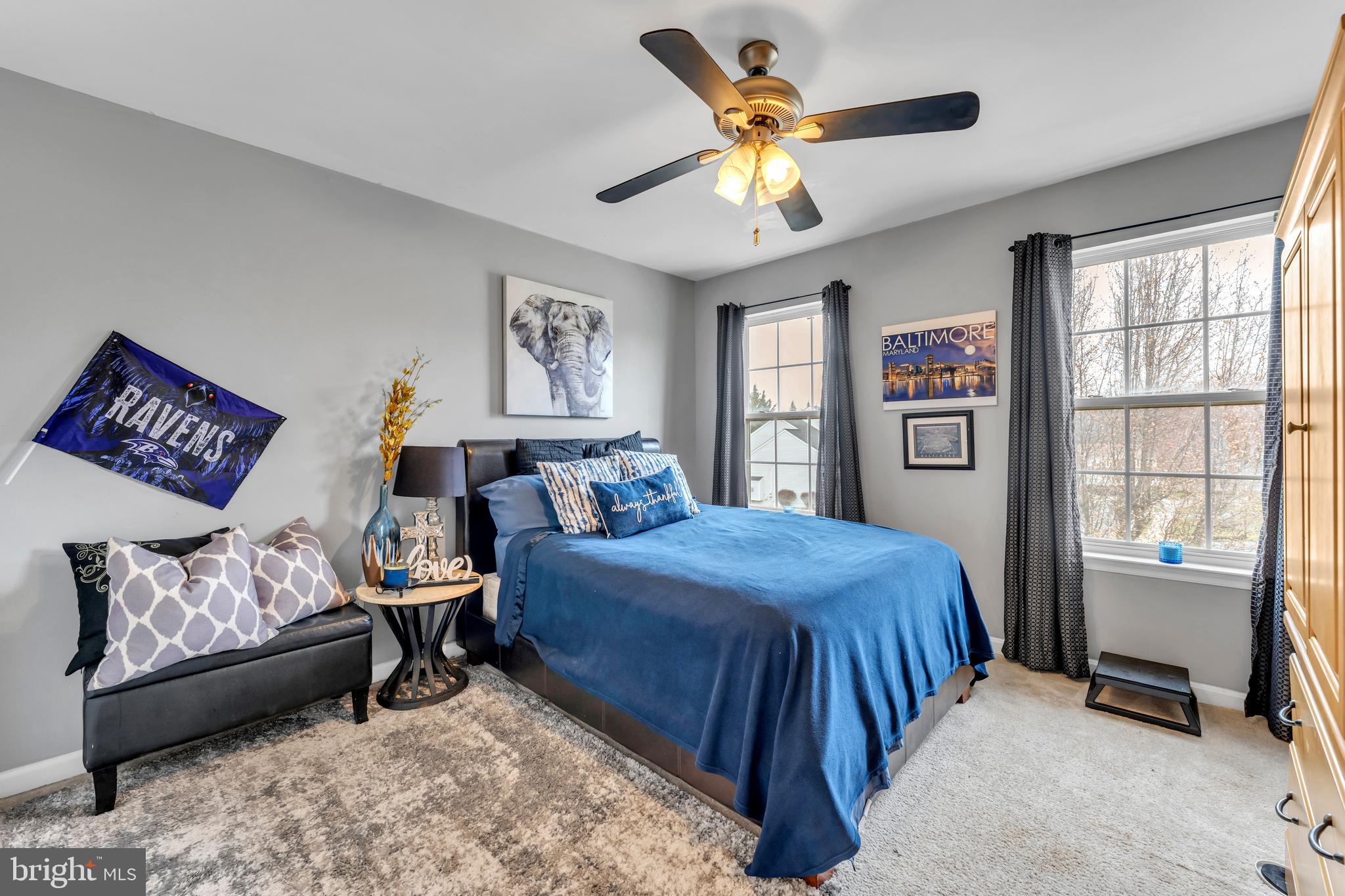 5660 Compton Lane Eldersburg, MD 21784 - Photo 30 of 44 a bedroom with a bed and a table in it with window
