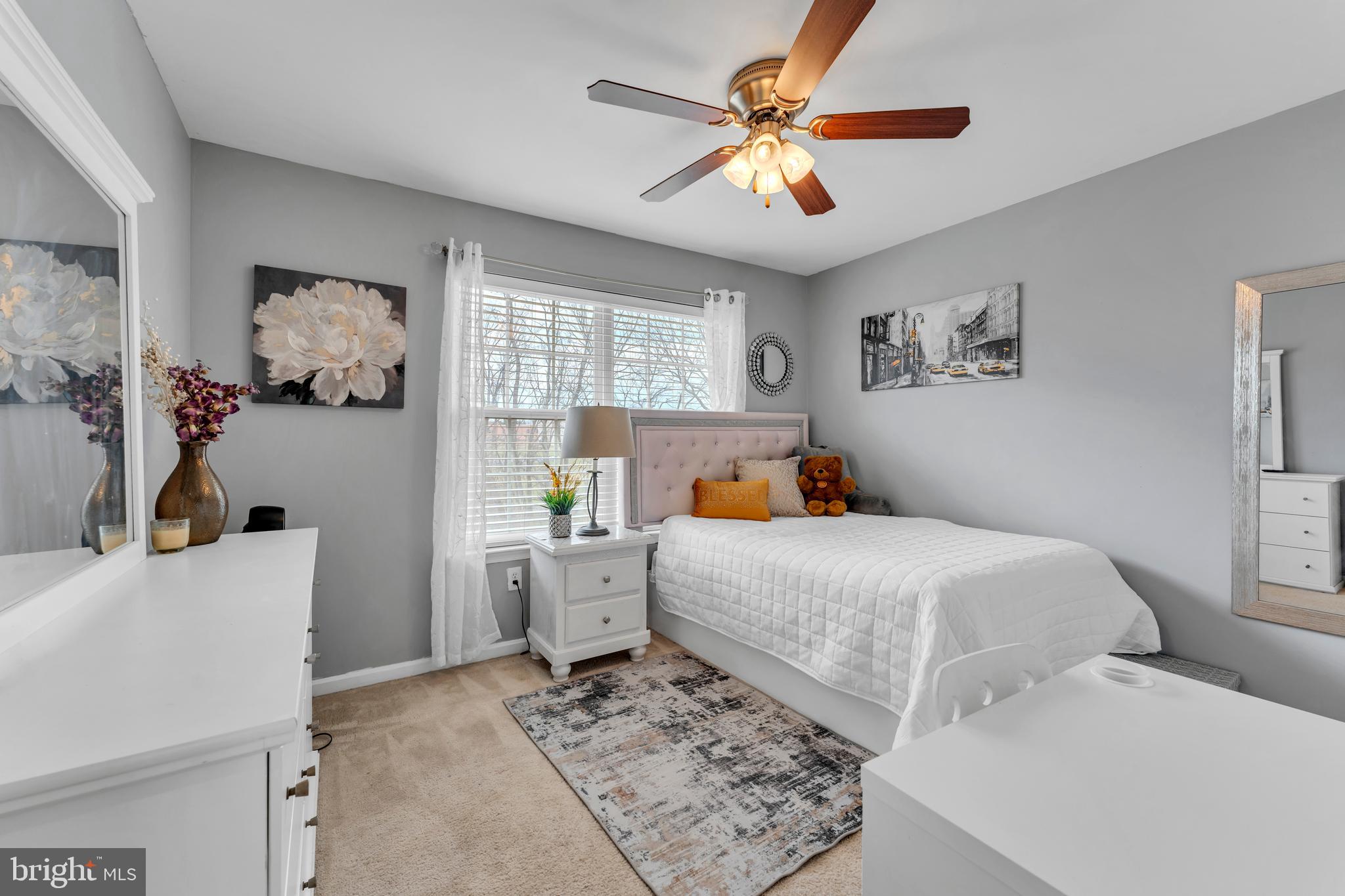 5660 Compton Lane Eldersburg, MD 21784 - Photo 31 of 44 a bedroom with a large bed and a window