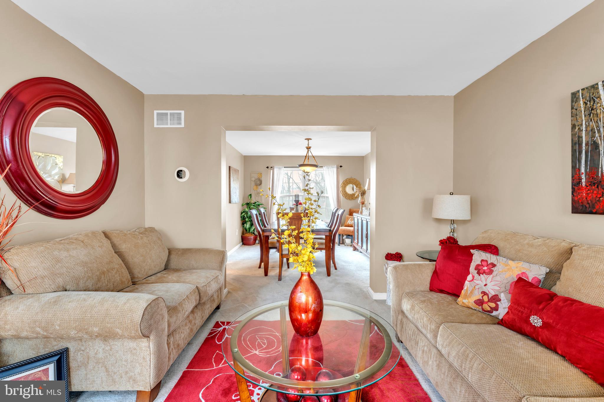 5660 Compton Lane Eldersburg, MD 21784 - Photo 6 of 44 a living room with furniture and a chandelier