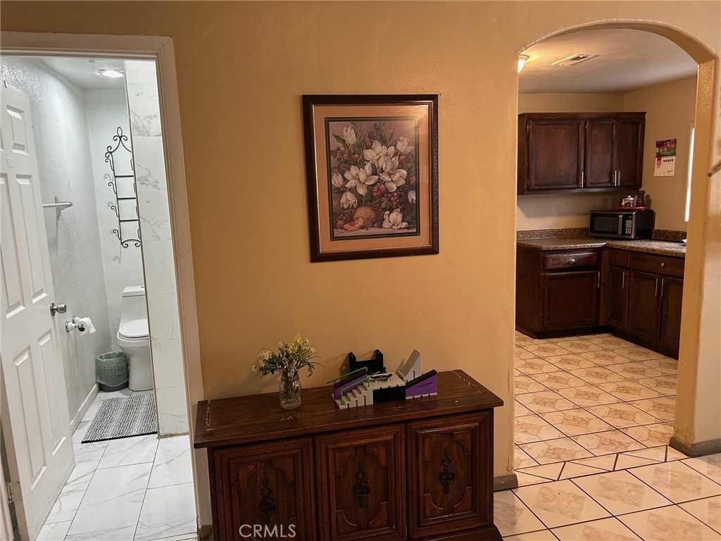 1214 E Street Corona, CA 92882 - Photo 18 of 28 Dining Room and entrance to kitchen and guest bath