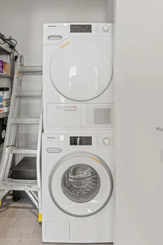 a bathroom with a toilet a sink and bathtub