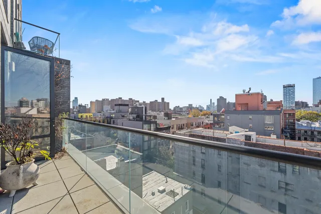 a view of a city from a balcony