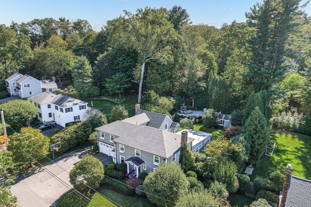 27 Radcliffe Road Wellesley, MA 02482 - Photo 1 of 38 an aerial view of a house with yard swimming pool and outdoor seating