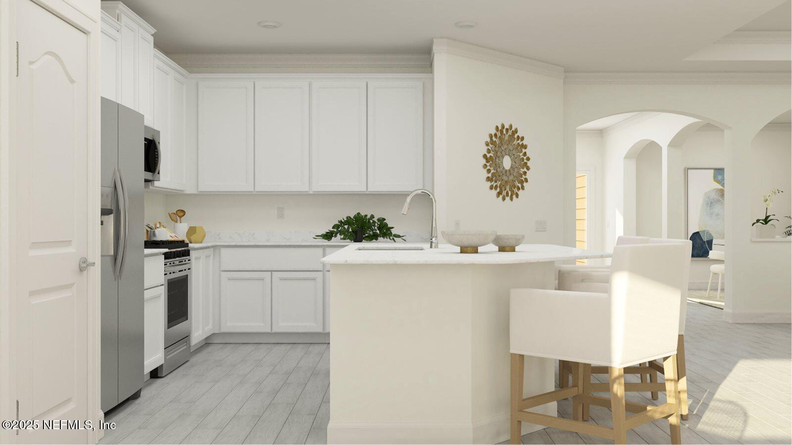 126 Hasler Avenue St. Augustine, FL 32092 - Photo 29 of 34 a kitchen with stainless steel appliances granite countertop a white cabinets and a refrigerator