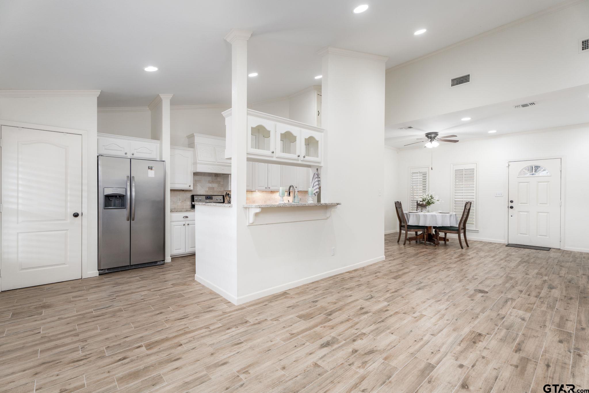 353 Deer Creek Road Big Sandy, TX 75755 - Photo 2 of 30 a view of kitchen with stainless steel appliances refrigerator oven table and chairs