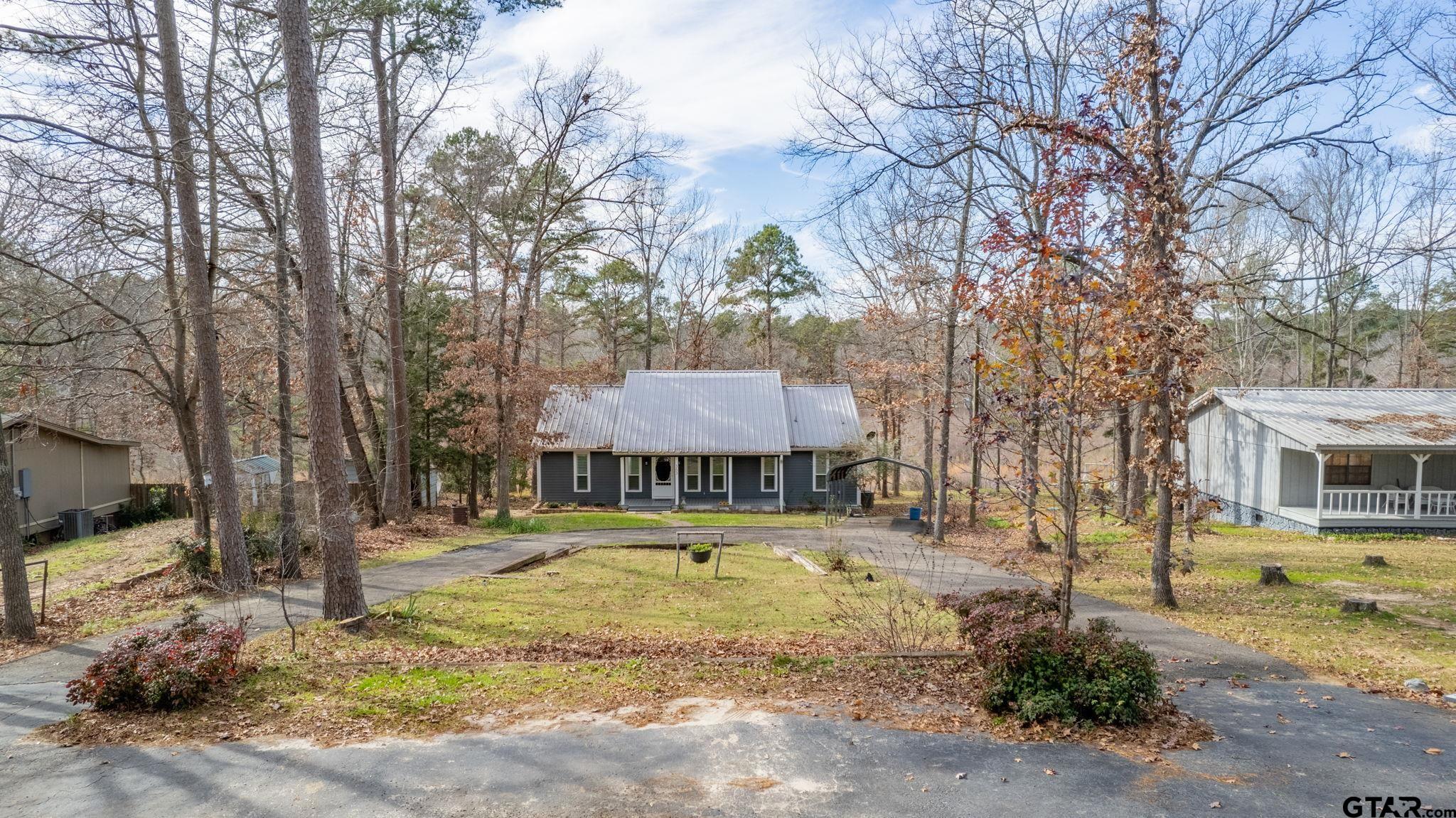 353 Deer Creek Road Big Sandy, TX 75755 - Photo 25 of 30 a view of swimming pool with a patio