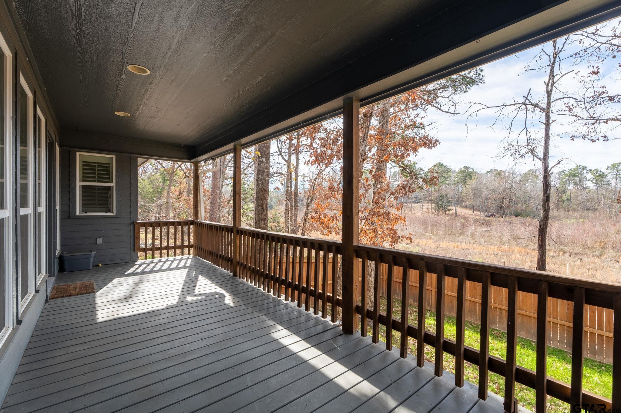 353 Deer Creek Road Big Sandy, TX 75755 - Photo 5 of 30 a view of a porch with wooden floor