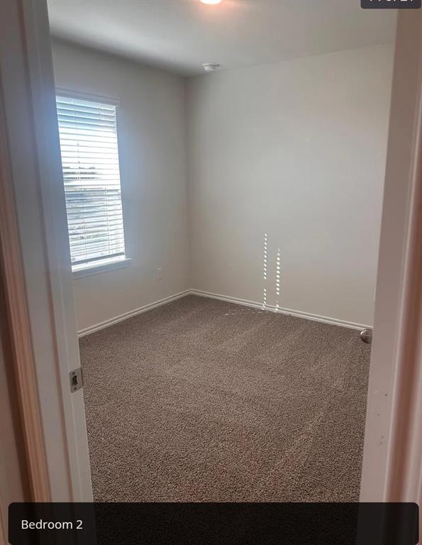 6015 Pinion Trail Princeton, TX 75407 - Photo 10 of 17 an empty room with a window