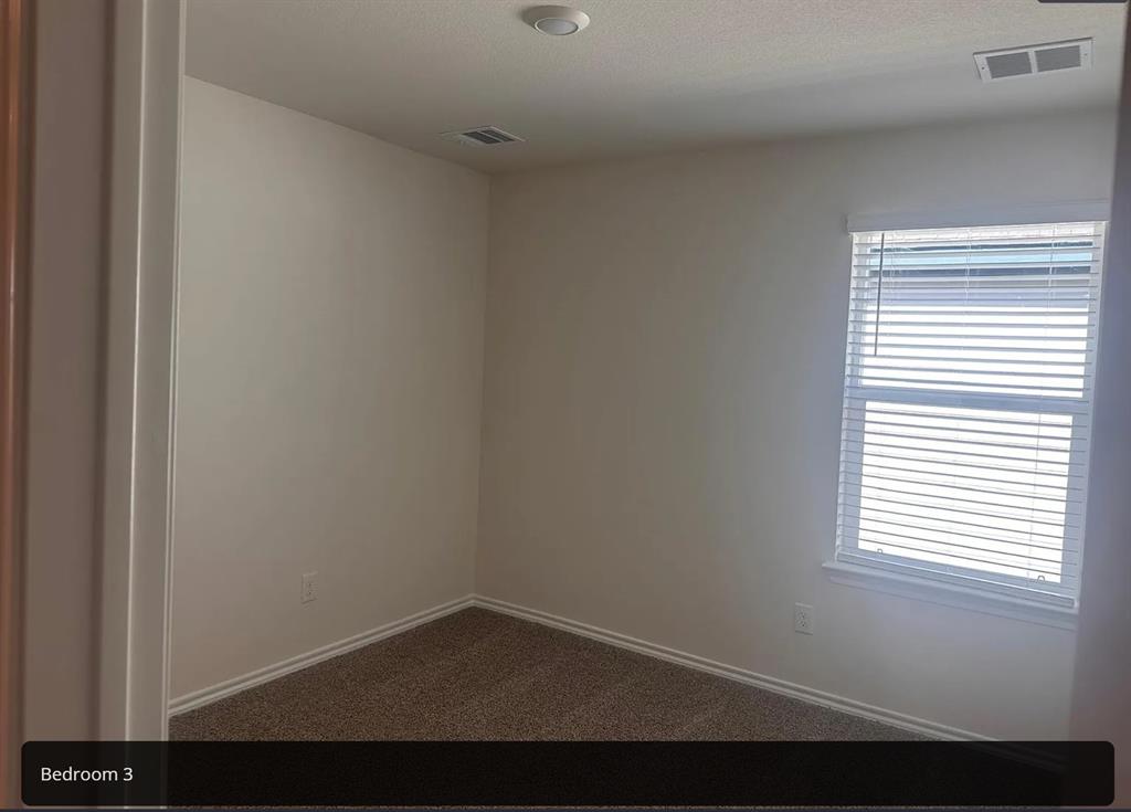 6015 Pinion Trail Princeton, TX 75407 - Photo 11 of 17 a view of an empty room with a window