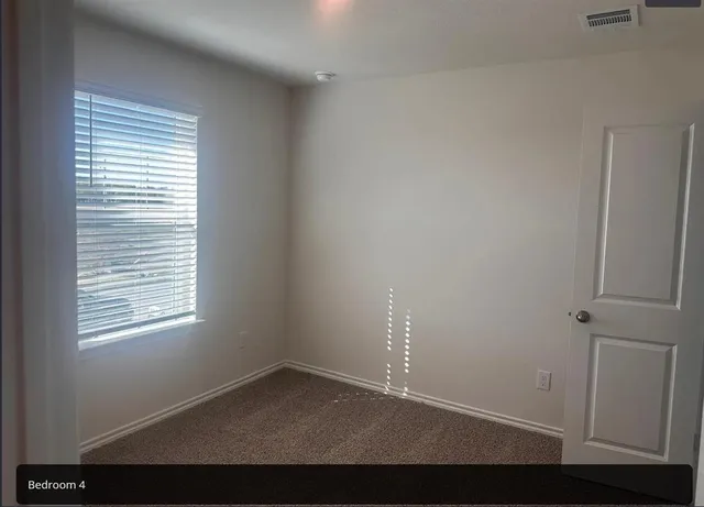 a view of empty room with window
