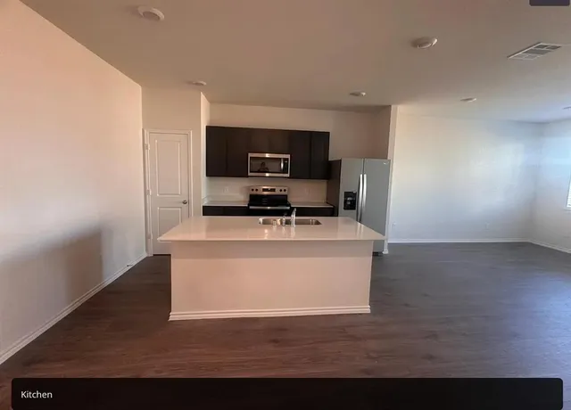 a view of living room with furniture and flat screen tv
