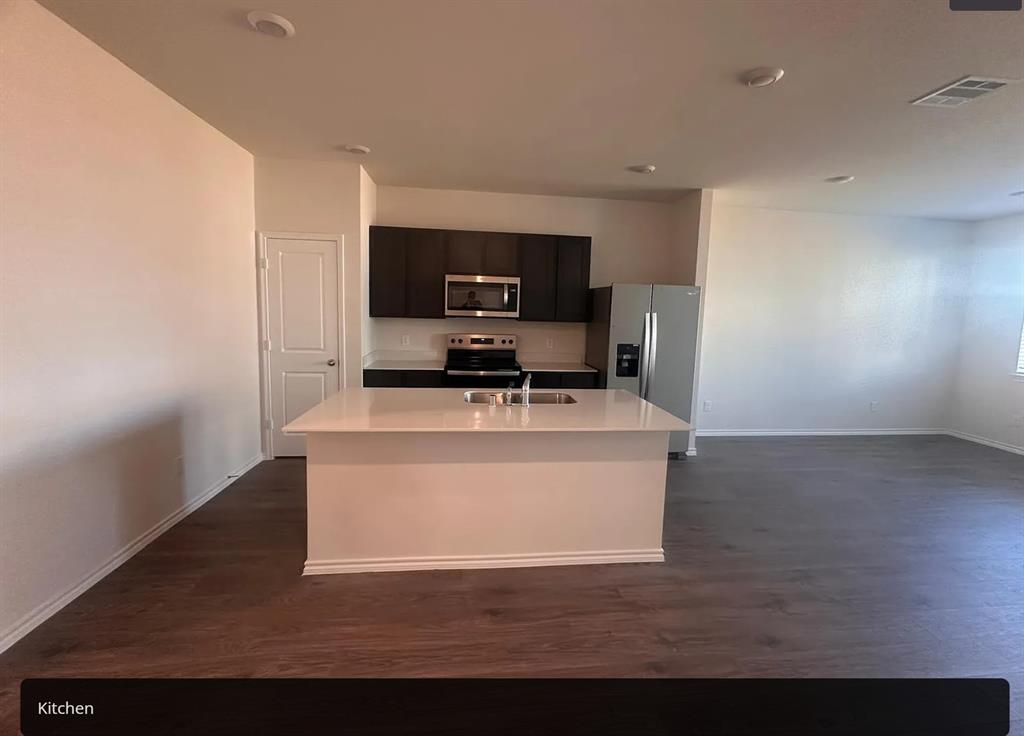 6015 Pinion Trail Princeton, TX 75407 - Photo 4 of 17 a view of living room with furniture and flat screen tv