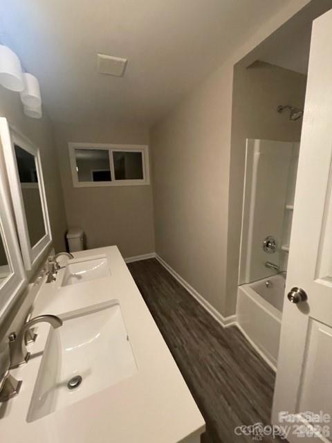 3826 Langley Road Charlotte, NC 28215 - Photo 12 of 15 a bathroom with a sink and a mirror