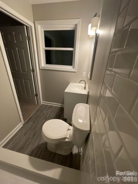 3826 Langley Road Charlotte, NC 28215 - Photo 13 of 15 a bathroom with a toilet and a shower