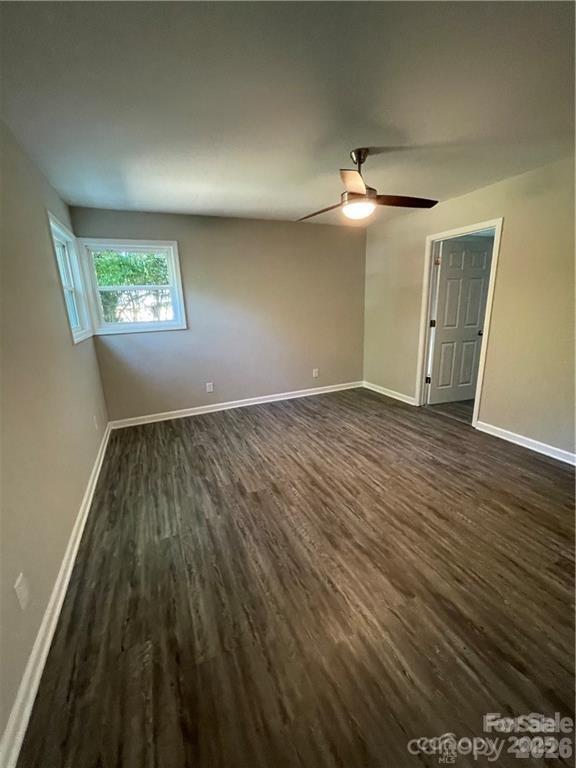 3826 Langley Road Charlotte, NC 28215 - Photo 14 of 15 wooden floor in an empty room with a window
