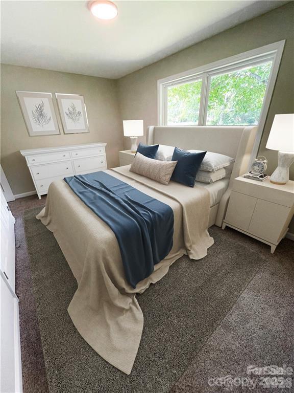 3826 Langley Road Charlotte, NC 28215 - Photo 5 of 15 a bedroom with bed and a large window