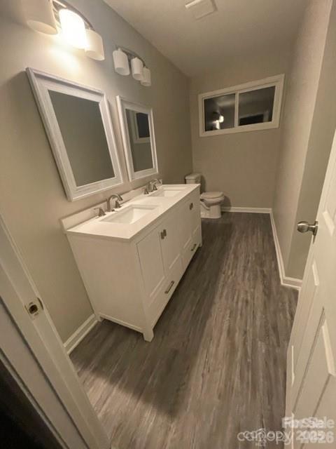 3826 Langley Road Charlotte, NC 28215 - Photo 9 of 15 a bathroom with a sink mirror and window