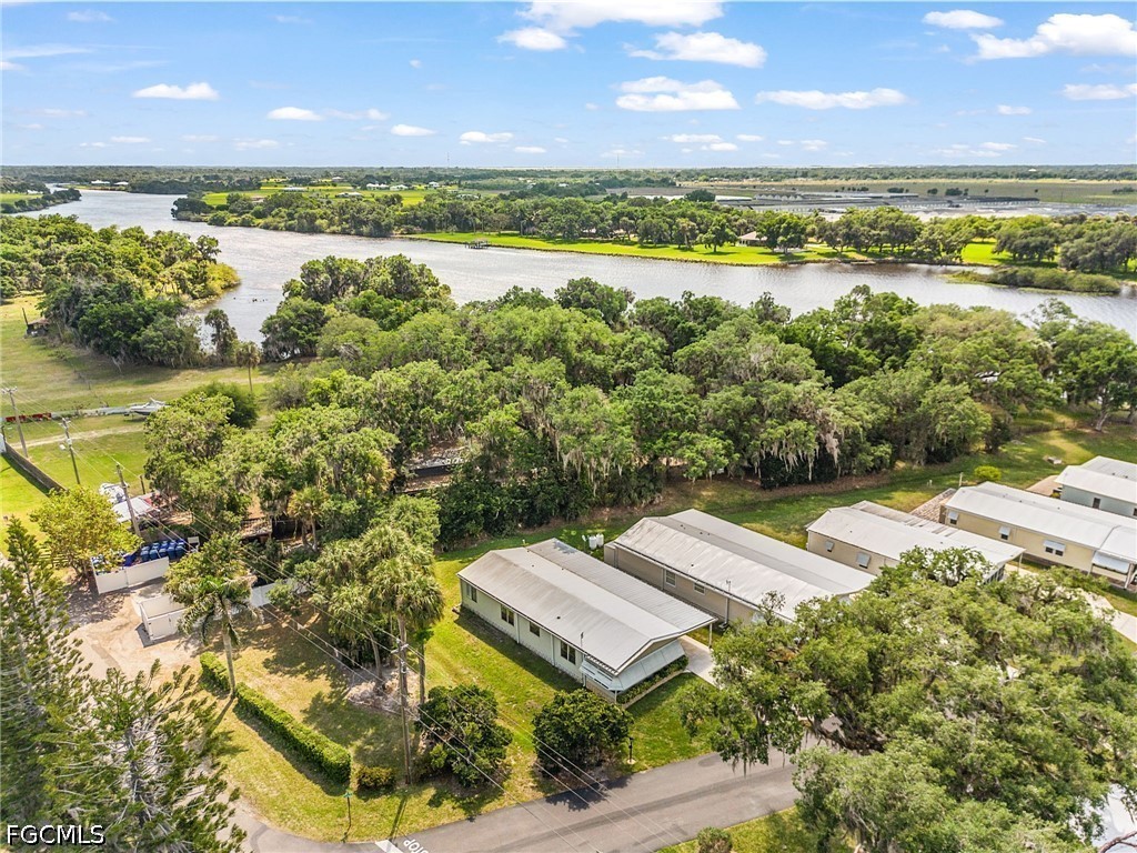 5 Erica Street Alva, FL 33920 - Photo 30 of 37 a view of an ocean and a building