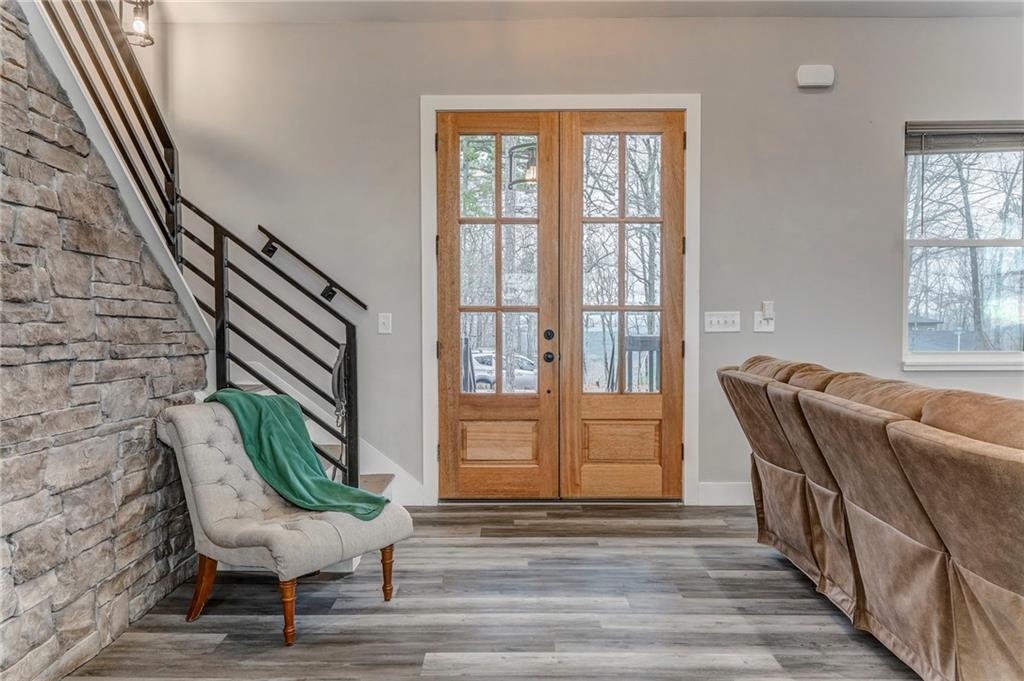 1172 Hunter Drive Ranger, GA 30734 - Photo 13 of 71 a living room with furniture and a large window