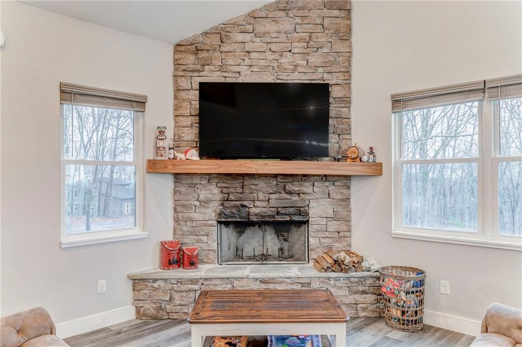 1172 Hunter Drive Ranger, GA 30734 - Photo 17 of 71 a living room with furniture and a fireplace