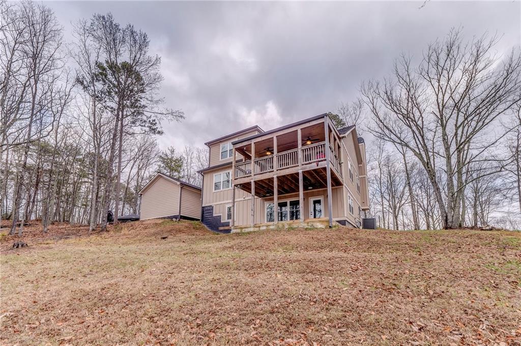 1172 Hunter Drive Ranger, GA 30734 - Photo 64 of 71 a view of a house with a yard
