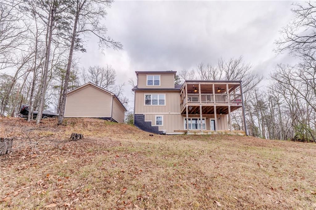 1172 Hunter Drive Ranger, GA 30734 - Photo 65 of 71 a view of a house with a yard