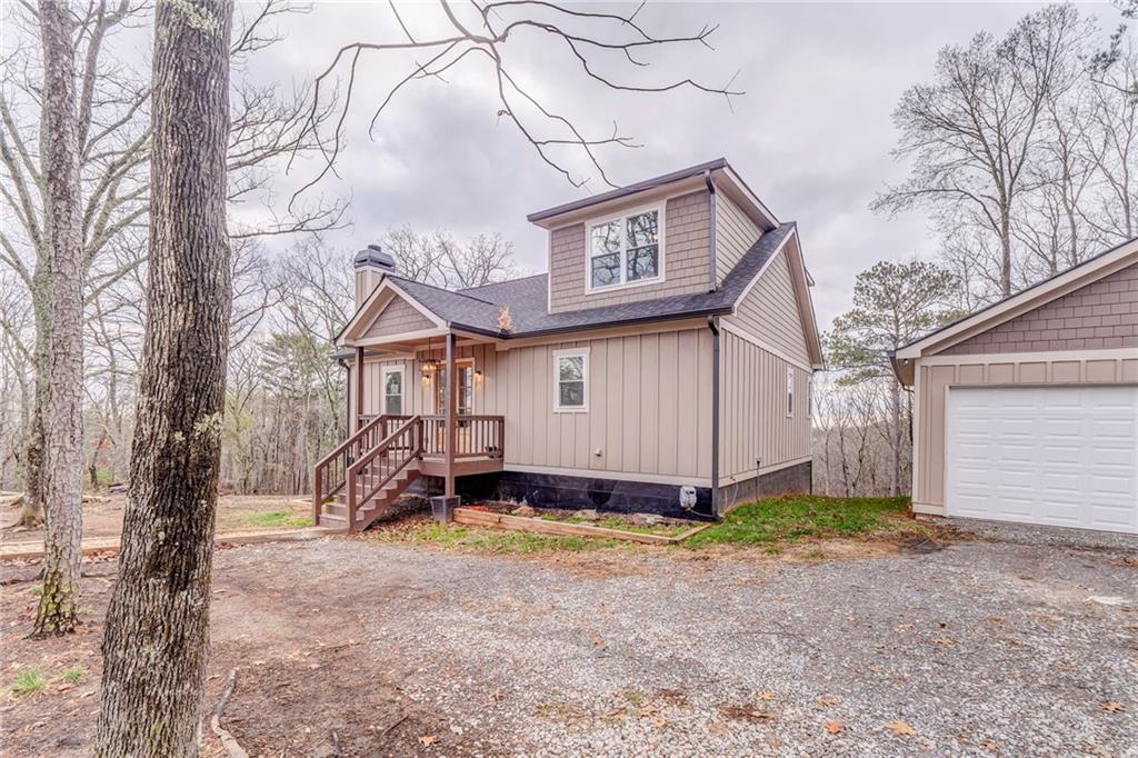 1172 Hunter Drive Ranger, GA 30734 - Photo 70 of 71 a view of a house with a yard and large tree