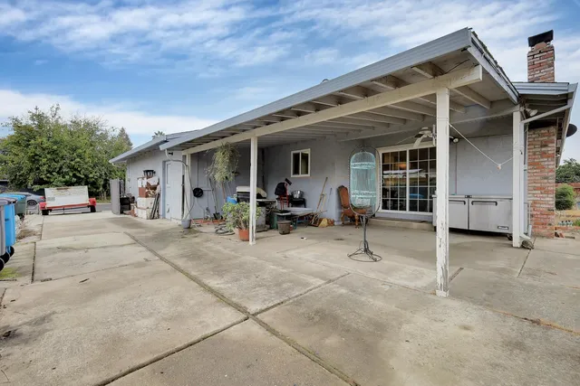 a view of a house with patio