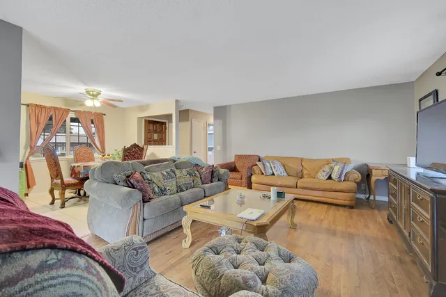 a living room with furniture and a couch