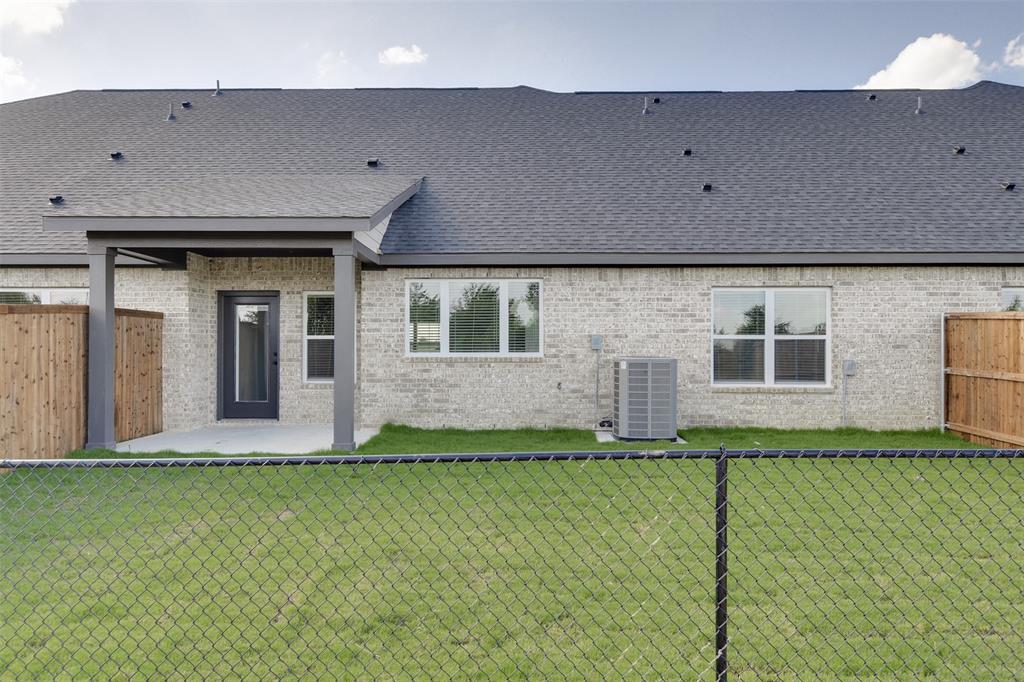 4218 Clovis Street Midlothian, TX 76065 - Photo 17 of 19 a front view of a house with a yard