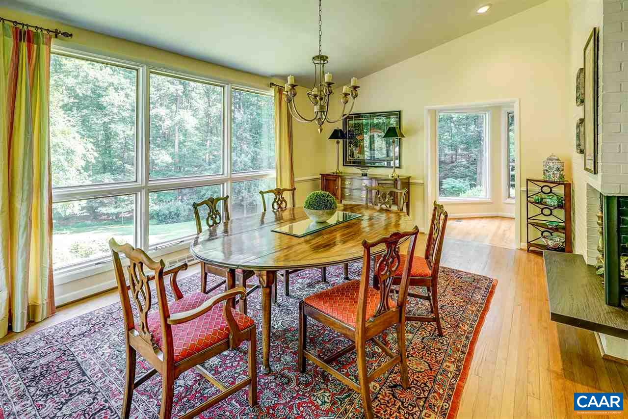 1075 Richmond Road Keswick, VA 22947 - Photo 11 of 50 a dining room with furniture and wooden floor