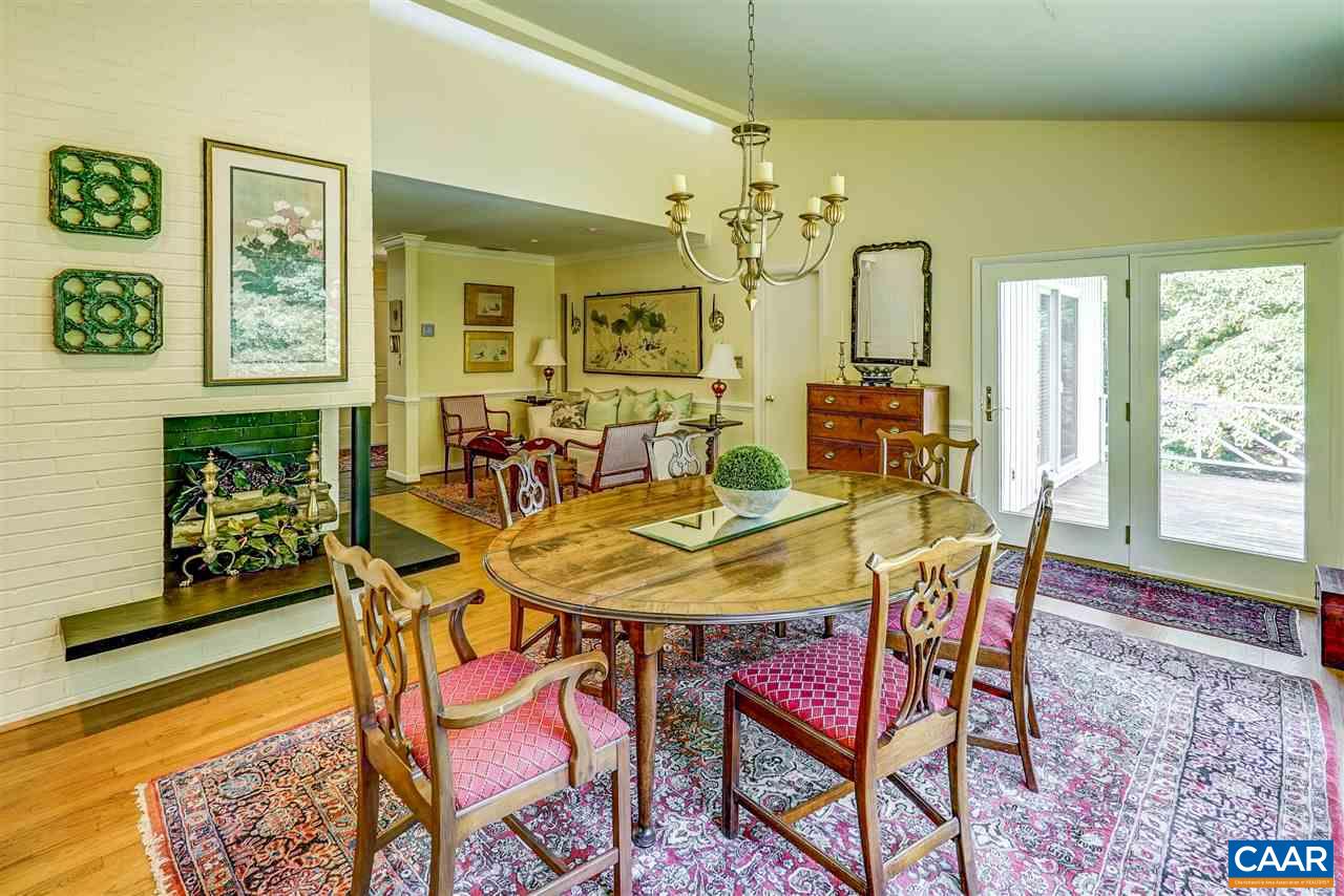 1075 Richmond Road Keswick, VA 22947 - Photo 13 of 50 a view of a dining room with furniture window and wooden floor