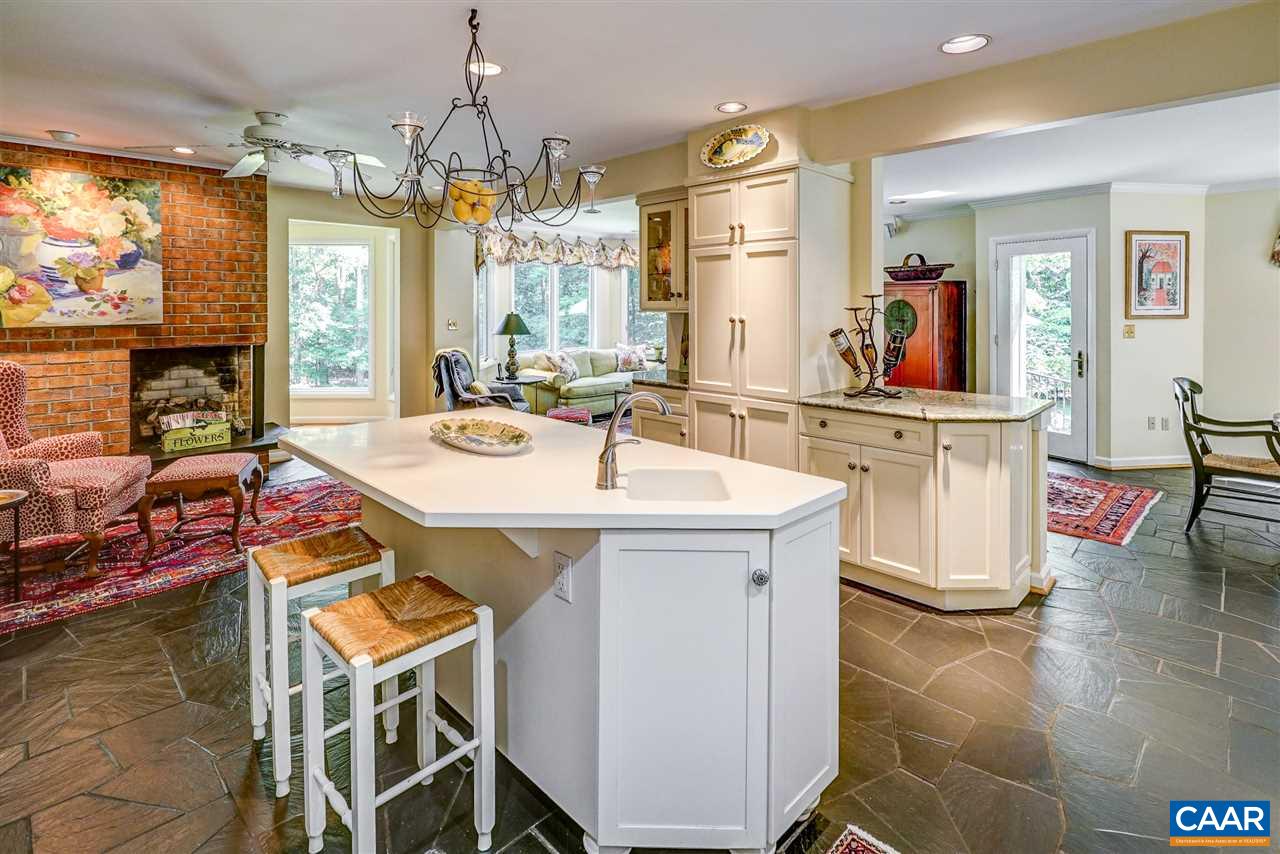 1075 Richmond Road Keswick, VA 22947 - Photo 20 of 50 a view of a dining room with furniture window and outside view