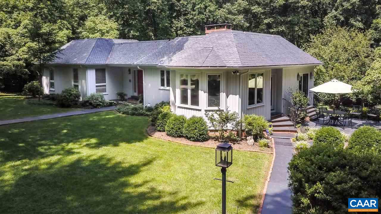 1075 Richmond Road Keswick, VA 22947 - Photo 3 of 50 a front view of a house with yard and green space