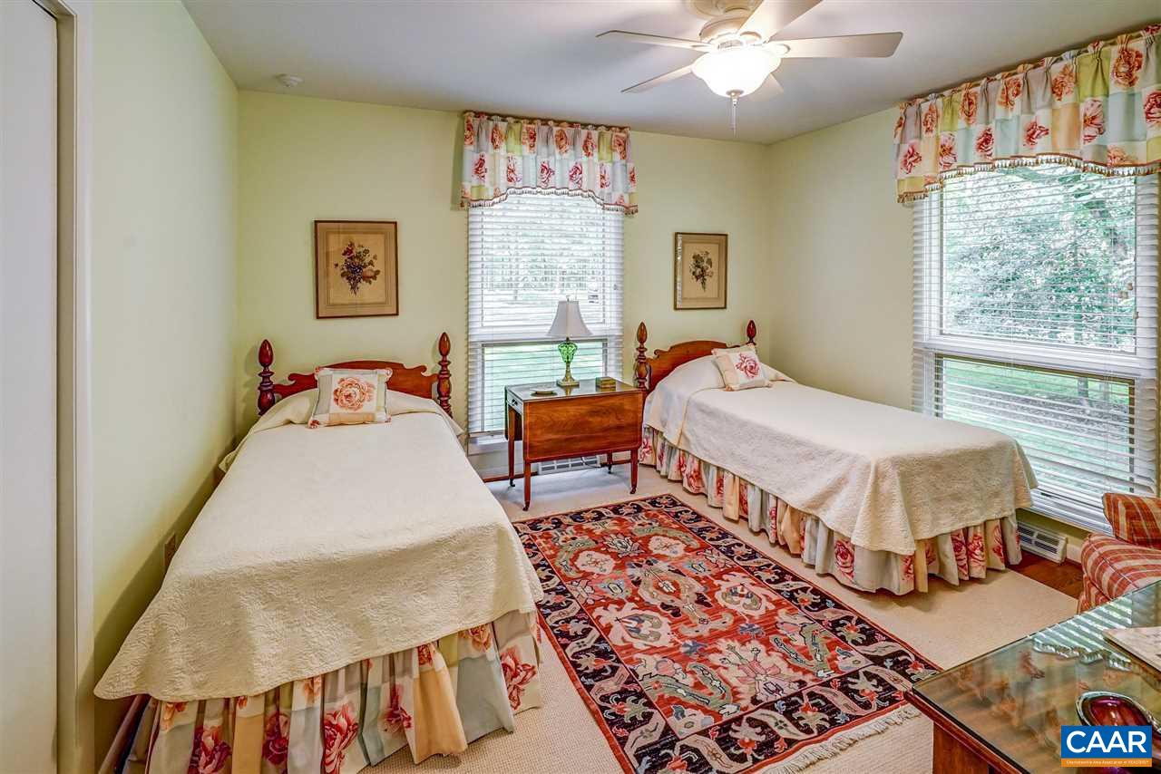 1075 Richmond Road Keswick, VA 22947 - Photo 34 of 50 a bedroom with bed and a window