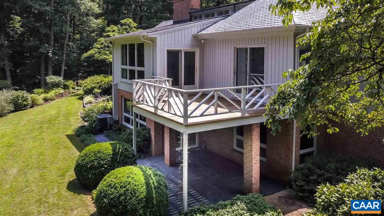 1075 Richmond Road Keswick, VA 22947 - Photo 43 of 50 a front view of a house with garden