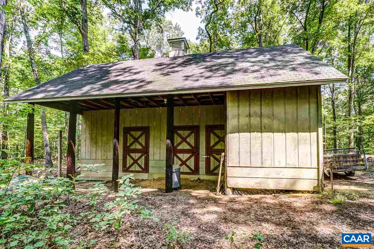 1075 Richmond Road Keswick, VA 22947 - Photo 50 of 50 a backyard of a house with barbeque oven