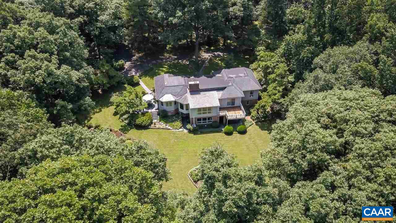1075 Richmond Road Keswick, VA 22947 - Photo 5 of 50 an aerial view of a house with a yard basket ball court and outdoor seating