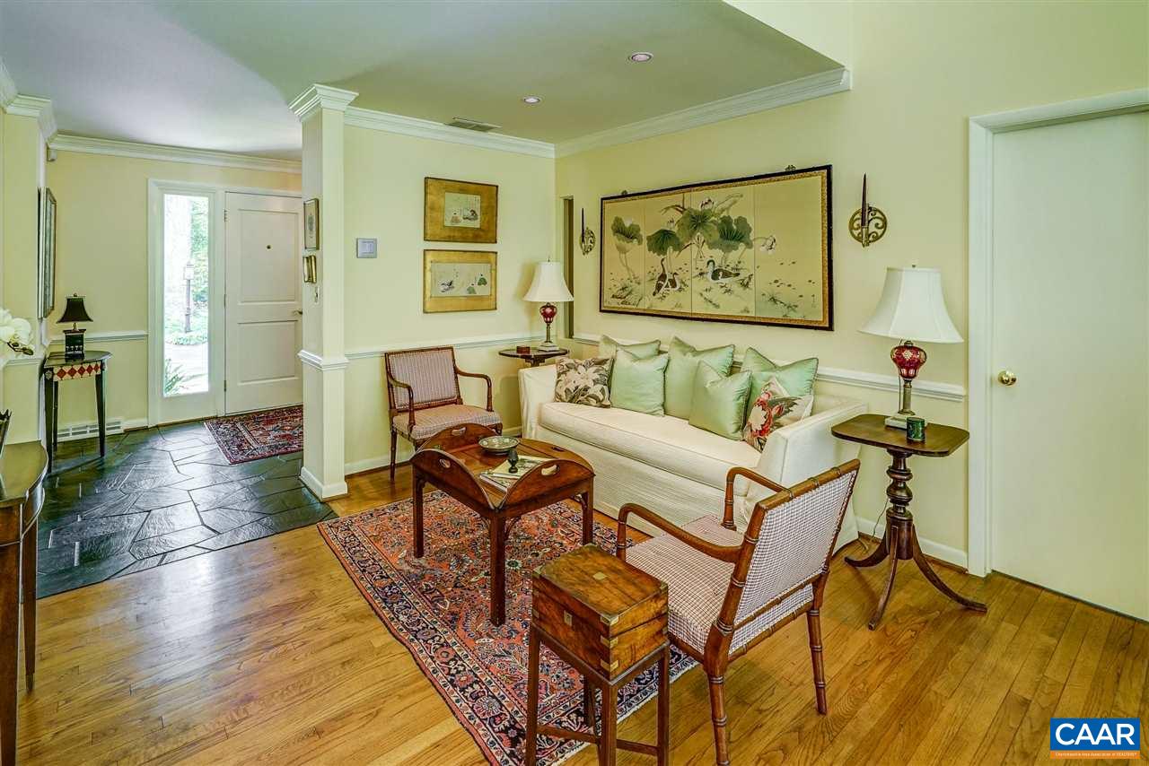 1075 Richmond Road Keswick, VA 22947 - Photo 10 of 50 a living room with fireplace furniture and a wooden floor