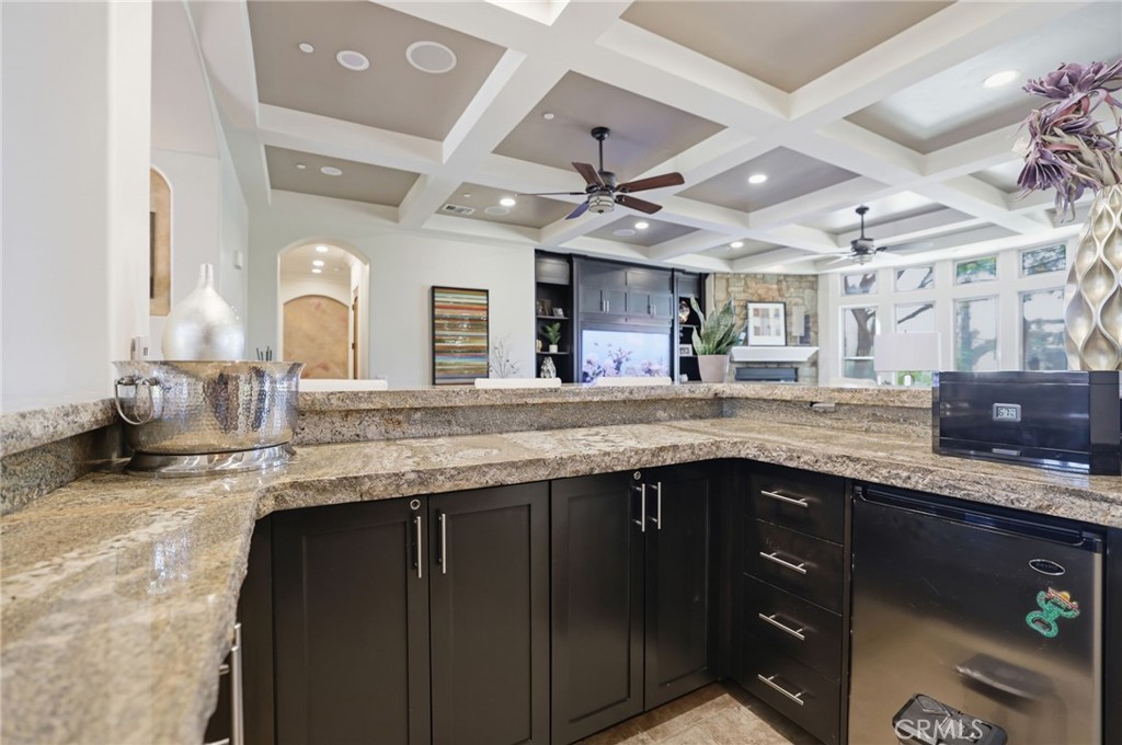 14779 Wood Riverside, CA 92508 - Photo 21 of 70 a kitchen with granite countertop a sink and cabinets