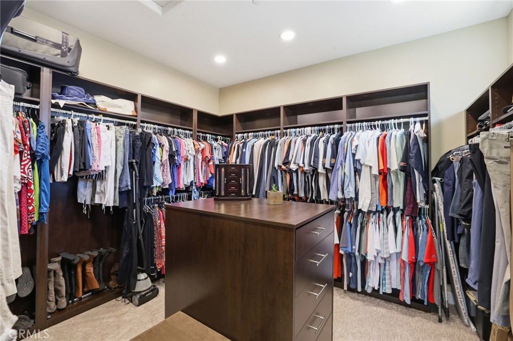 14779 Wood Riverside, CA 92508 - Photo 36 of 70 a view of walk in closet with clothes and shoes