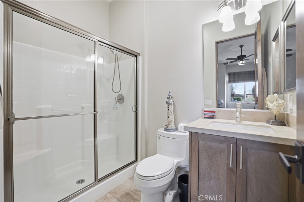 14779 Wood Riverside, CA 92508 - Photo 44 of 70 a bathroom with a sink a toilet and shower