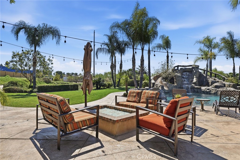 14779 Wood Riverside, CA 92508 - Photo 53 of 70 a view of a patio with couches and a fire pit