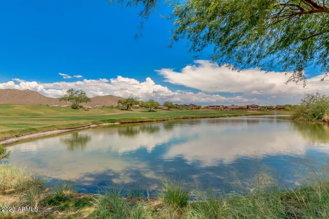 a view of a lake with a mountain in the background