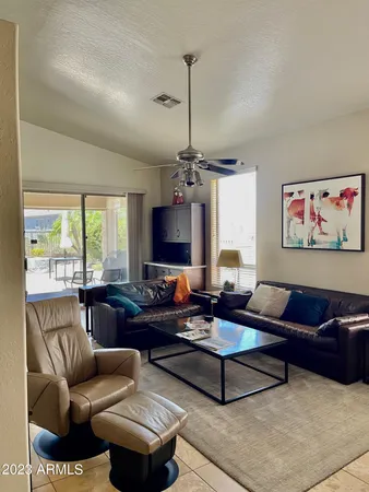 a living room with furniture or outdoor view and a large window