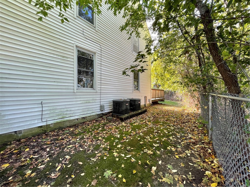 439 Main Road Tiverton, RI 02878 - Photo 8 of 16 Right side of House with A/C condensers