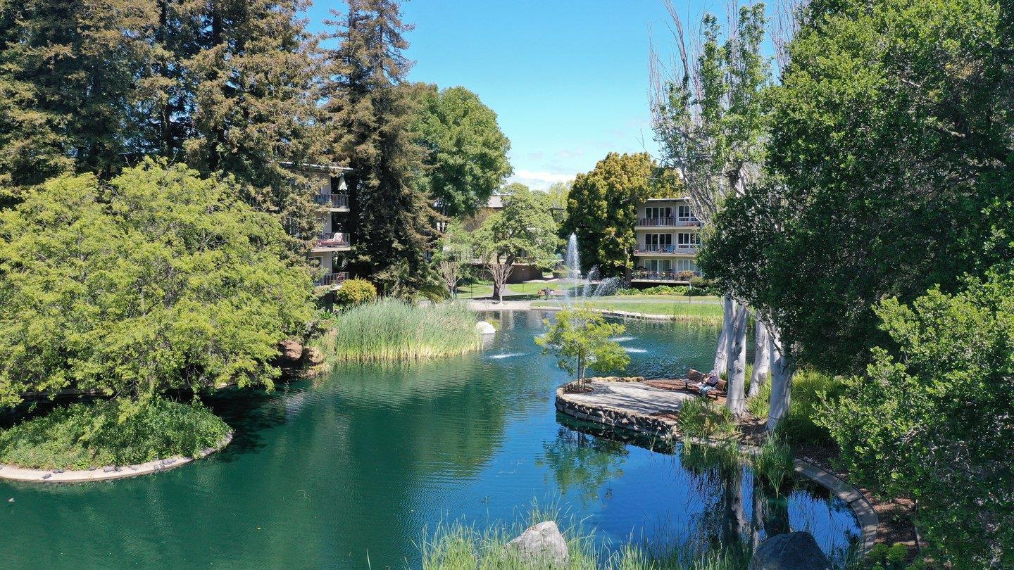 a view of a lake with a house