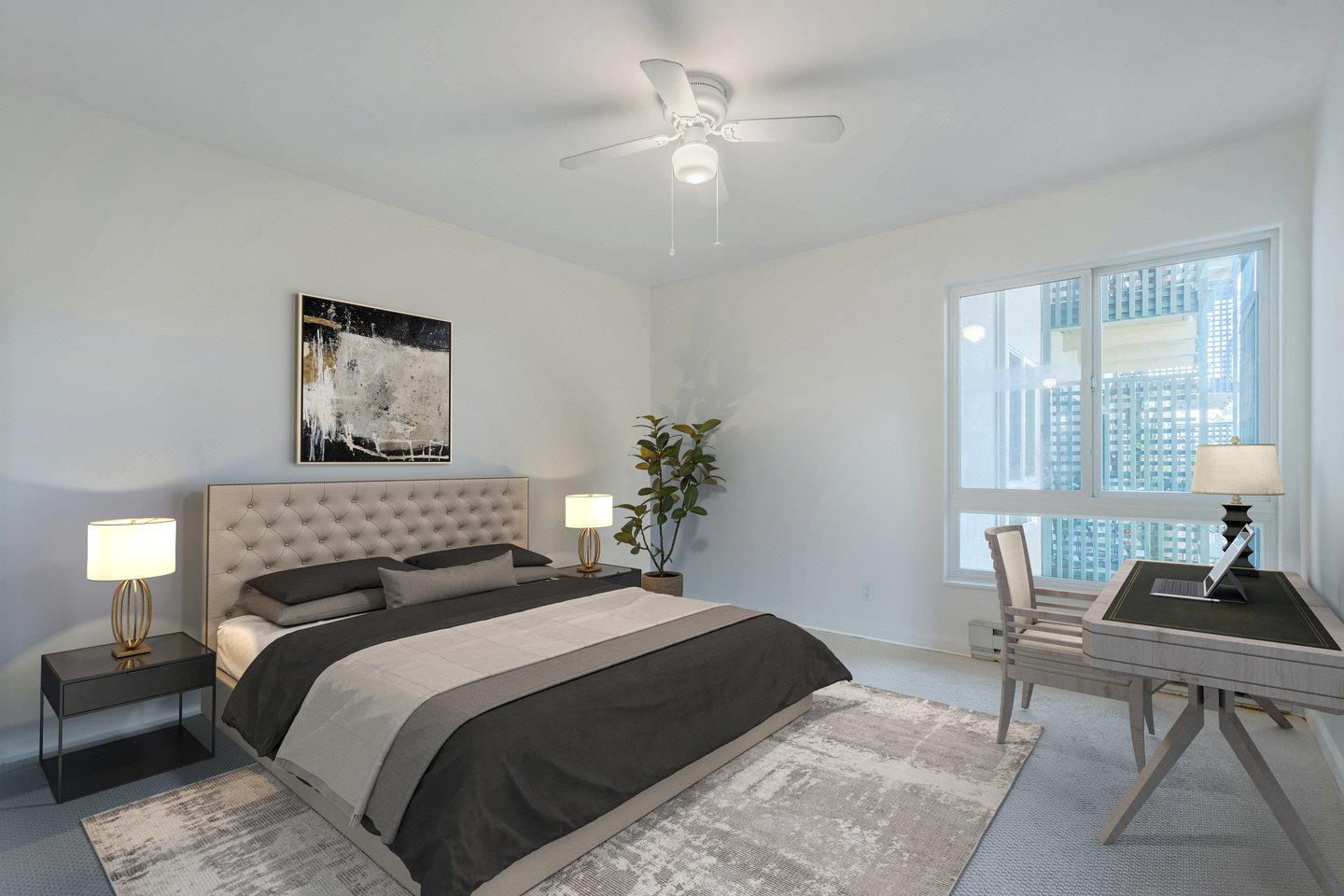 818 North Delaware Street, Unit 314 San Mateo, CA 94401 - Photo 7 of 18 a bedroom with a bed and a chair